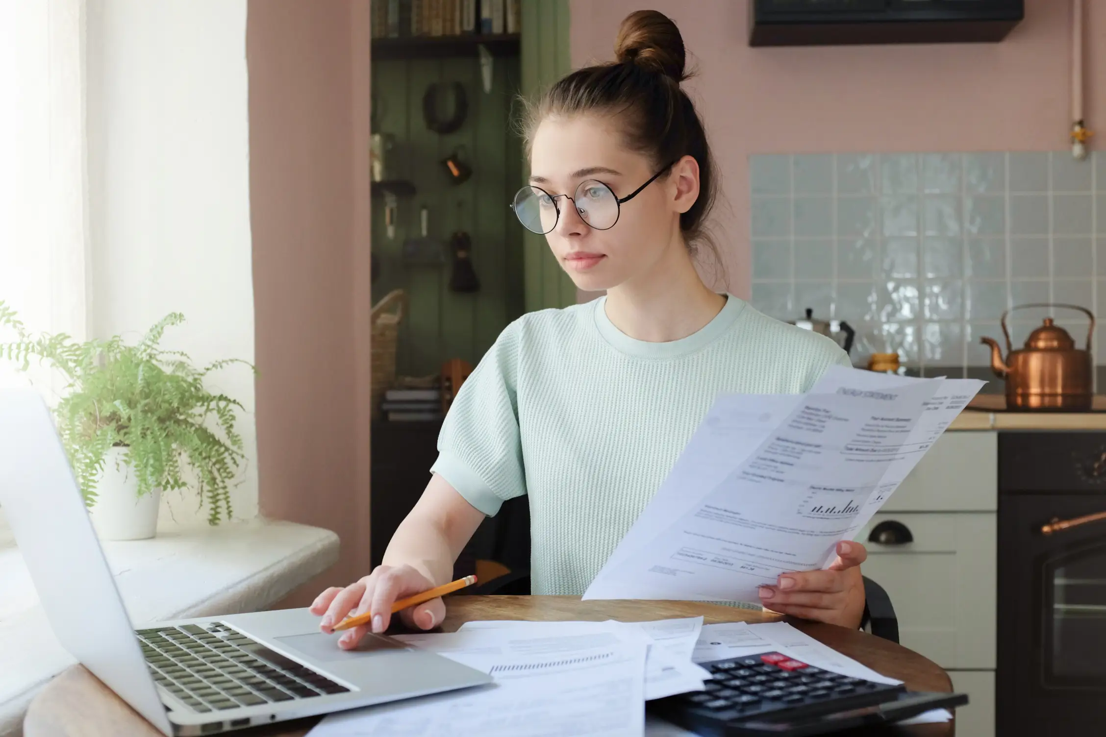 young-adult-applying-for-emergency-loan-on-laptop-to-handle-financial-struggles
