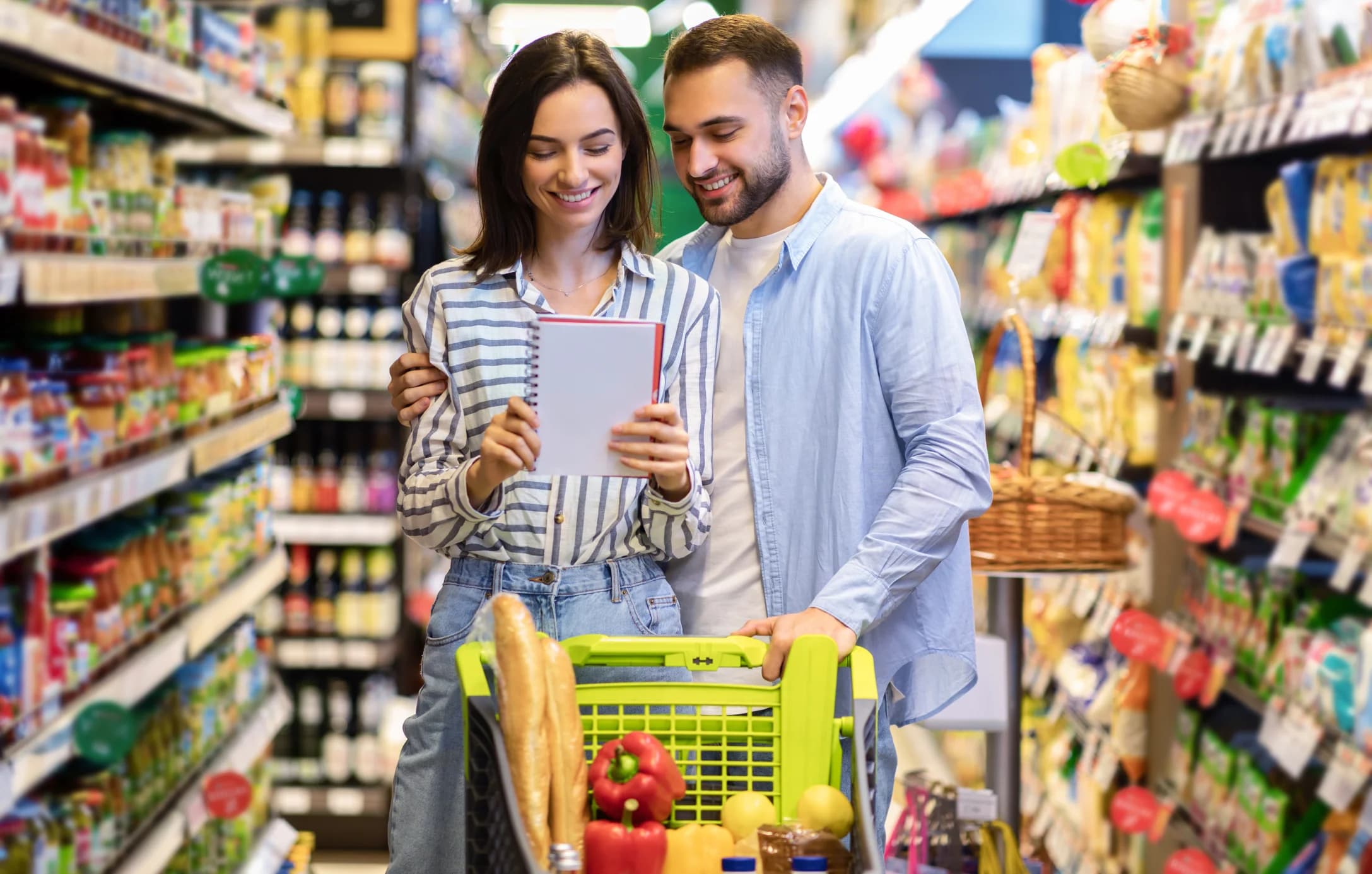 canadian-family-grocery-shopping-while-looking-for-budget-savings