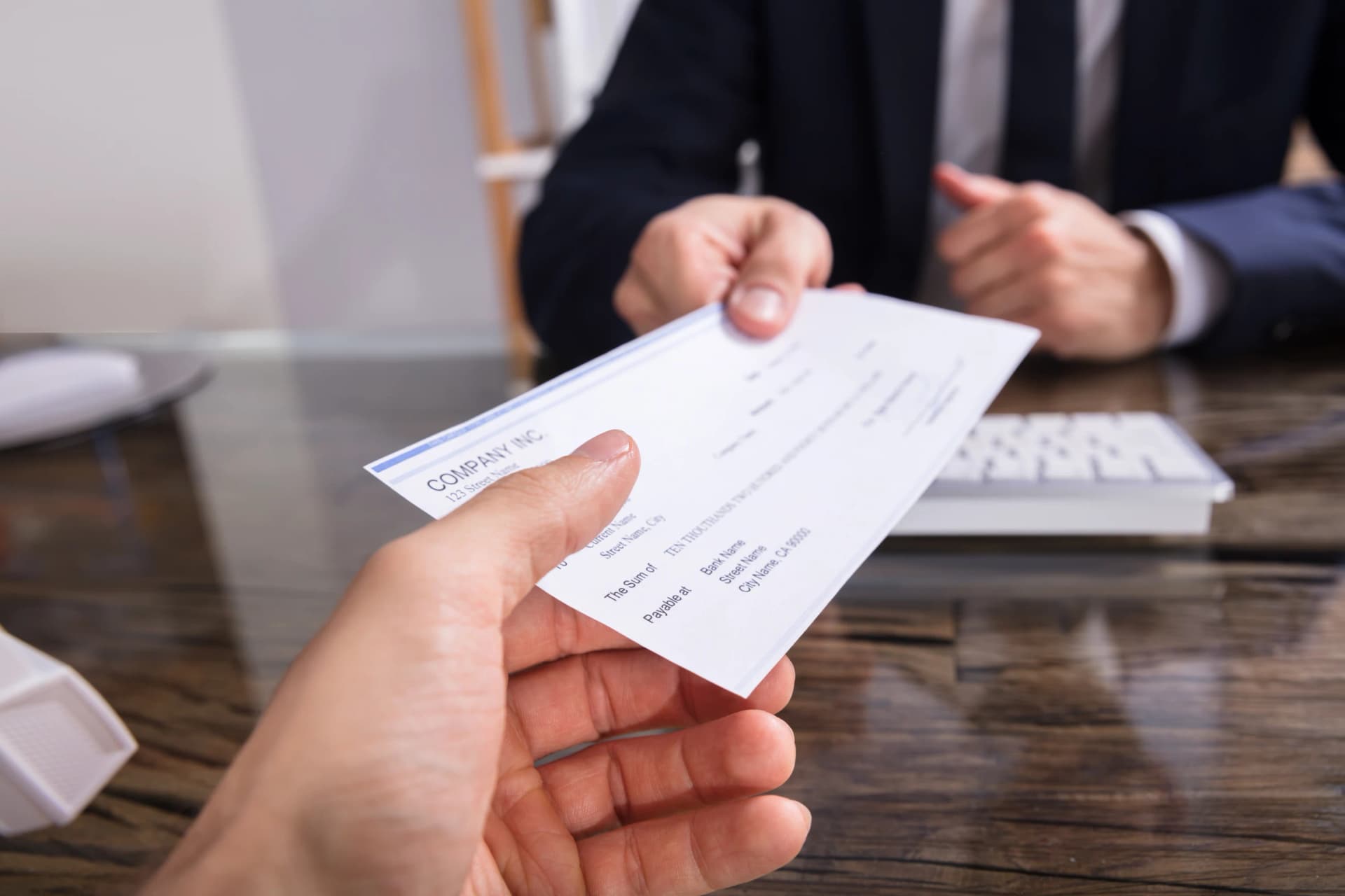 person-receiving-salary person-receiving-salary