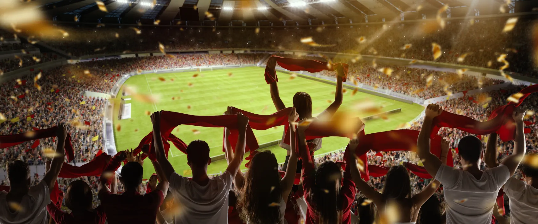 soccer fans cheering their team with colorful scarfs at crowded stadium soccer fans cheering their team with colorful scarfs at crowded stadium